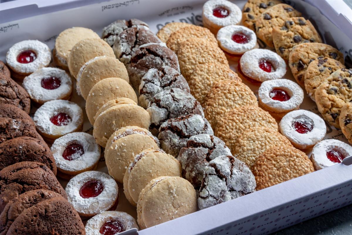 A tray of mixed cakes and cookies